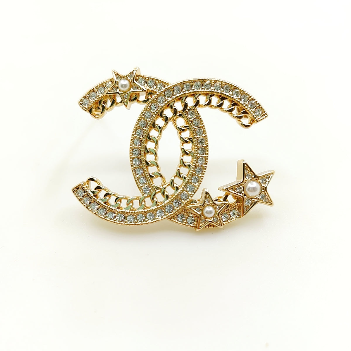 Chanel Star Crystal 18K Gold Brooch product image 1, provided for visual reference and product detail review