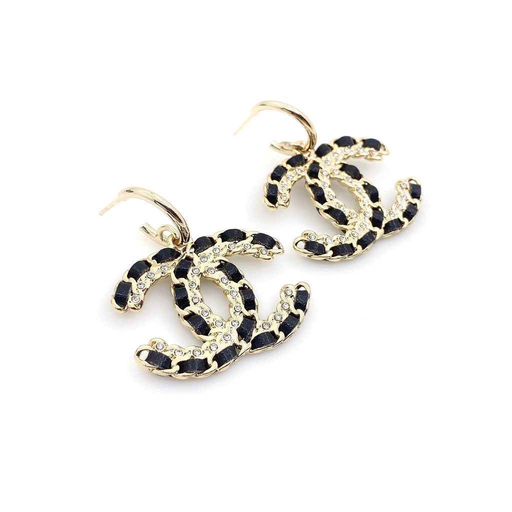 Chanel Pendant Leather 18K Gold Earrings product image 1, provided for visual reference and product detail review