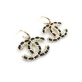 Chanel Pendant Leather 18K Gold Earrings product image 1, provided for visual reference and product detail review