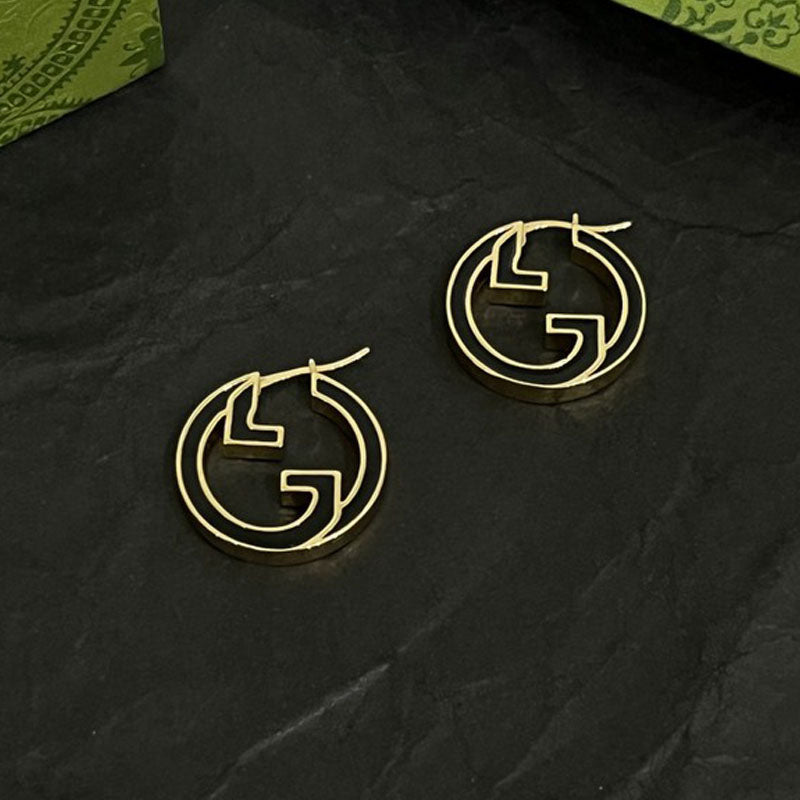 Gucci Double Color Hollow 18K Gold Earrings product image 1, provided for visual reference and product detail review
