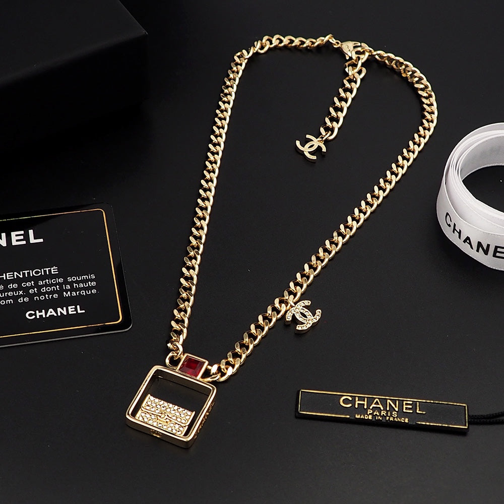 Chanel Red Bag Pendant 18K Gold Necklace product image 1, provided for visual reference and product detail review