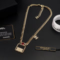 Chanel Red Bag Pendant 18K Gold Necklace product image 1, provided for visual reference and product detail review