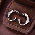 Prada Triangle Open 18K Gold Earrings product image 1, provided for visual reference and product detail review