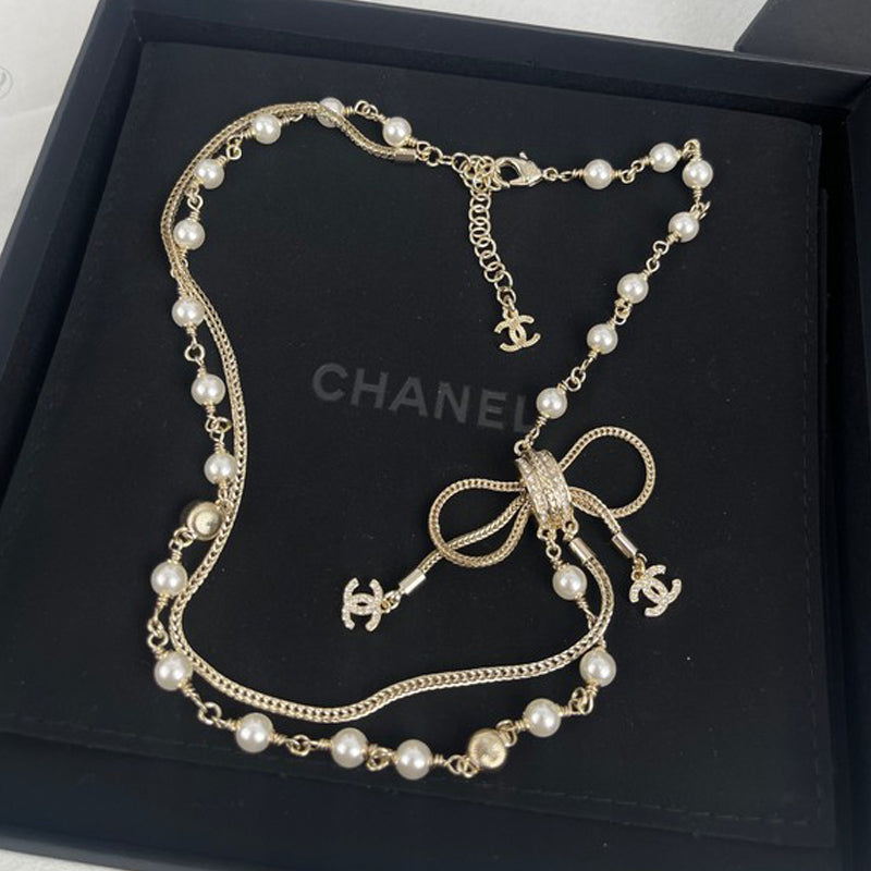 Chanel Bow Tie Pearl 18K Gold Necklace product image 1, provided for visual reference and product detail review