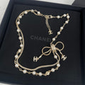Chanel Bow Tie Pearl 18K Gold Necklace product image 1, provided for visual reference and product detail review