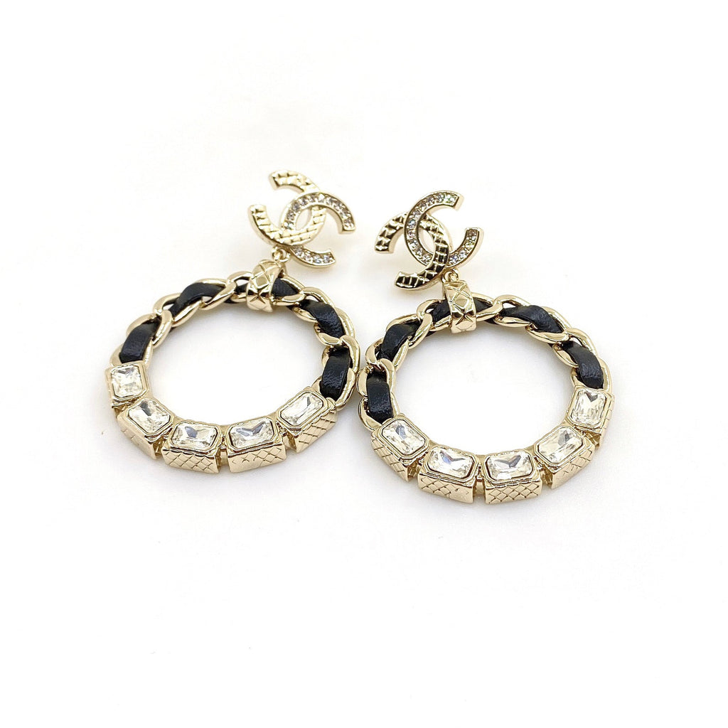 Chanel Leather Circle 18K Gold Earrings product image 1, provided for visual reference and product detail review