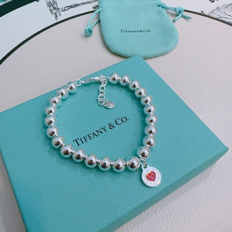 Tiffany Return to Red Heart Bead 18K Gold Bracelet product image 1, provided for visual reference and product detail review