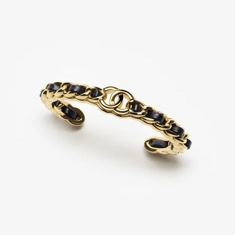 Chanel Black Leather Cuff 18K Gold Bracelet product image 1, provided for visual reference and product detail review