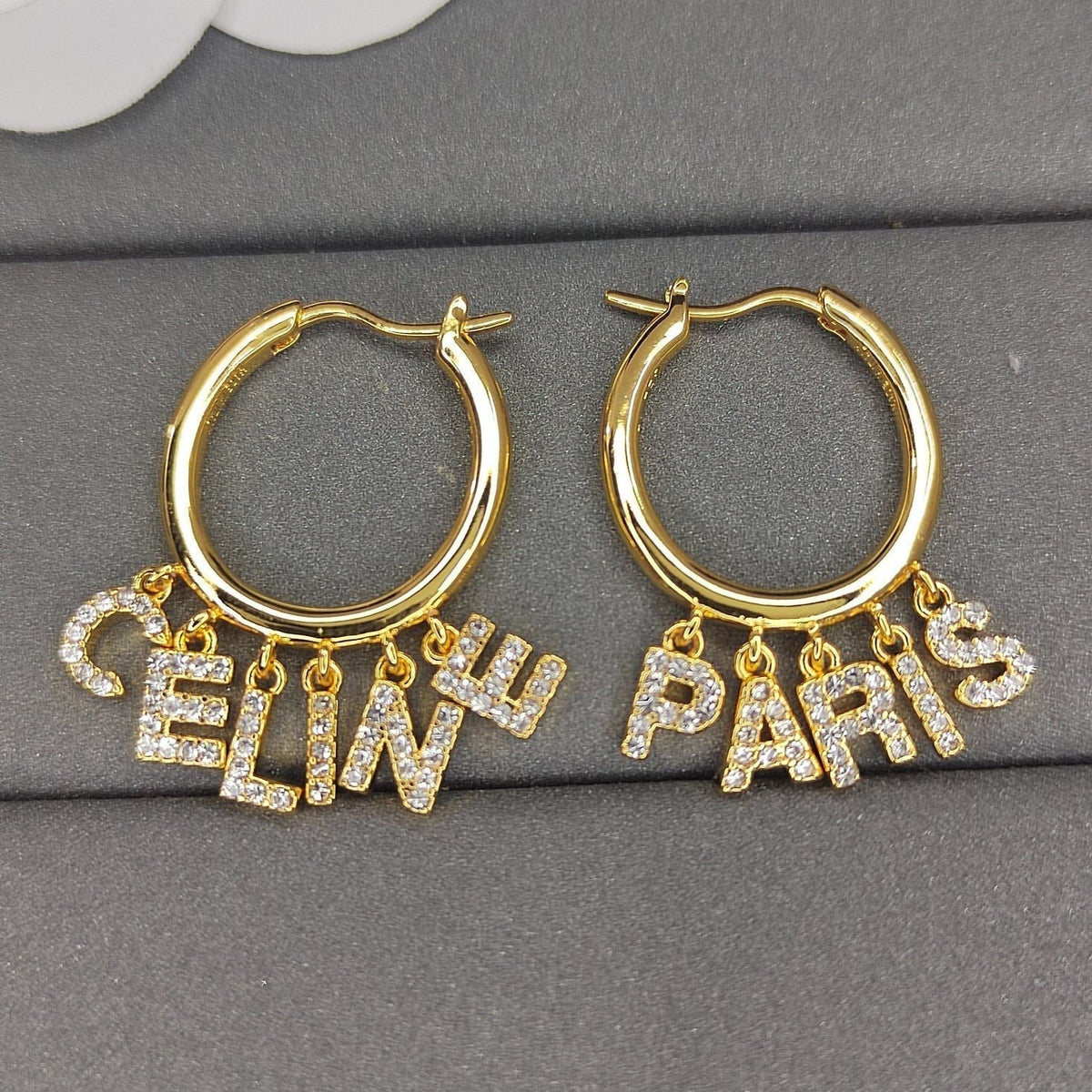Celine Script Diamonds 18K Gold Earrings product image 1, provided for visual reference and product detail review