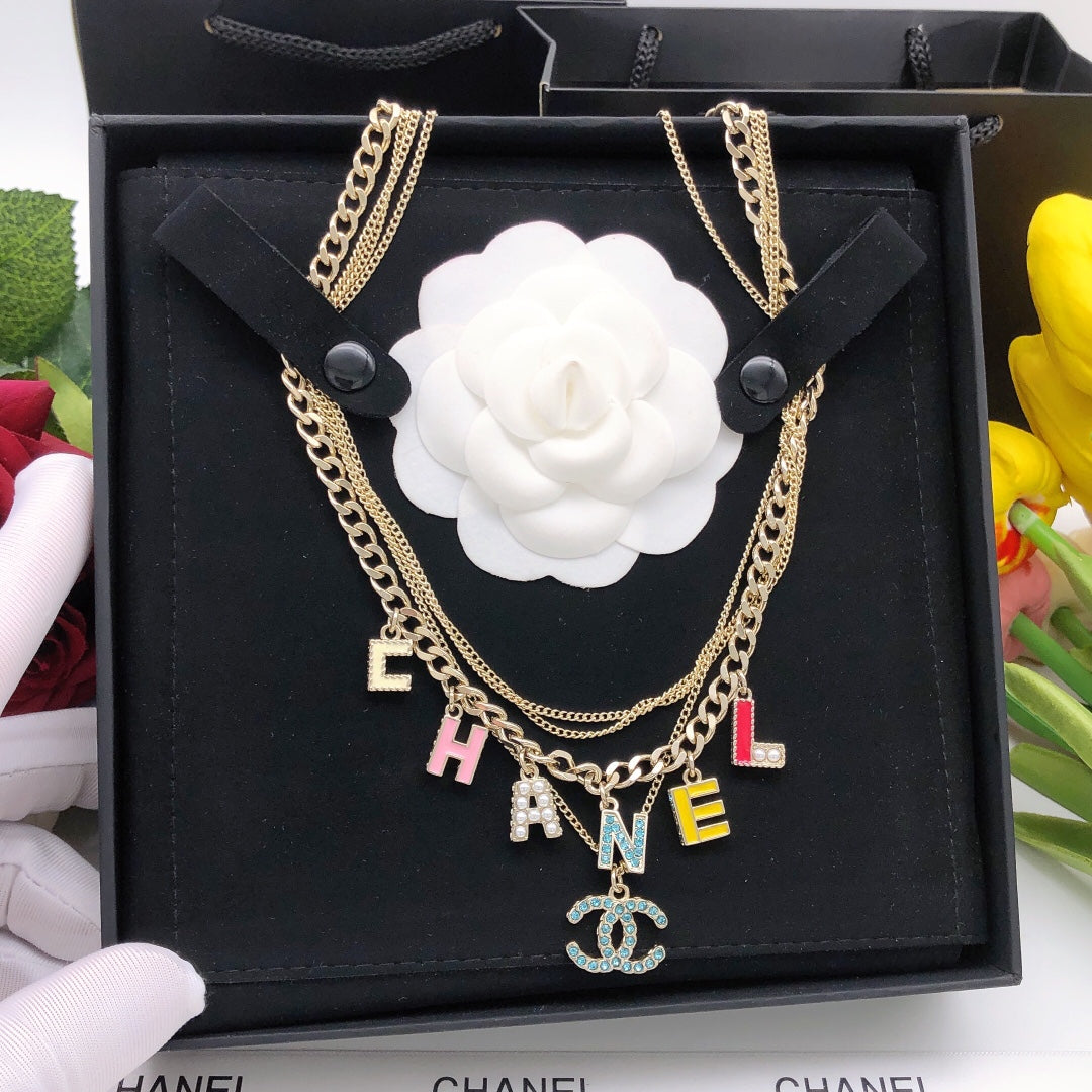 Chanel Color Typo 18K Gold Necklace product image 2, provided for visual reference and product detail review