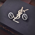 YSL Black Crystal 18K Gold Earrings product image 1, provided for visual reference and product detail review