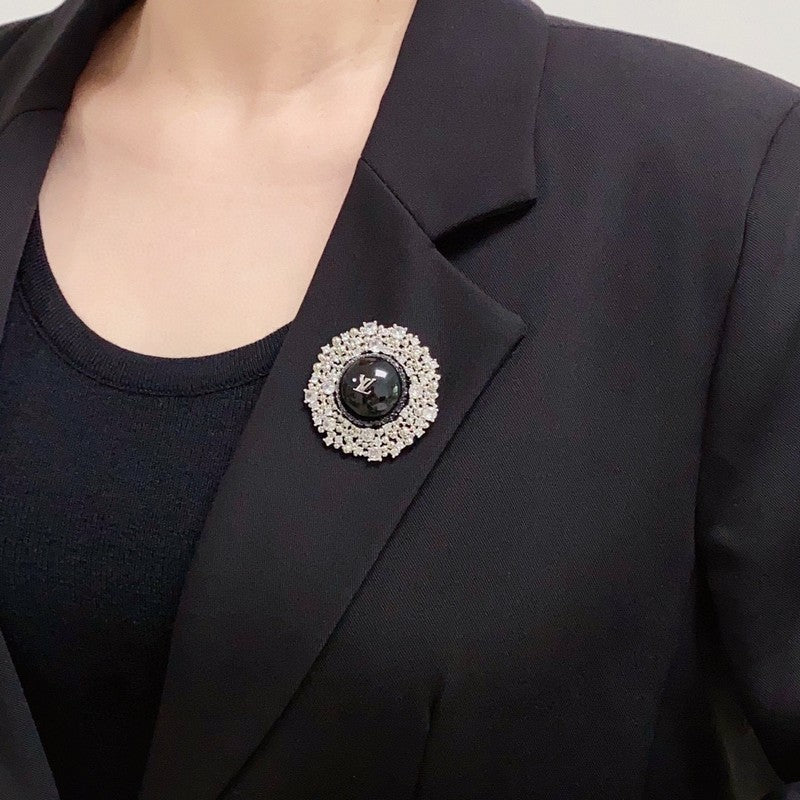 Louis Vuitton Black Ball 18K Gold Brooch product image 2, provided for visual reference and product detail review