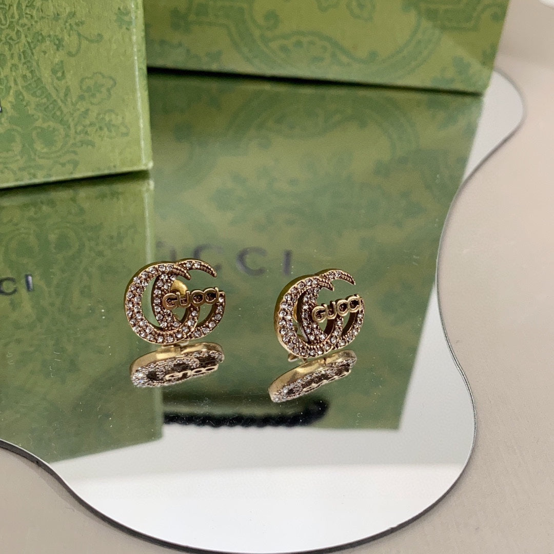 Gucci Double Logo Diamonds 18K Gold Earrings product image 8, provided for visual reference and product detail review