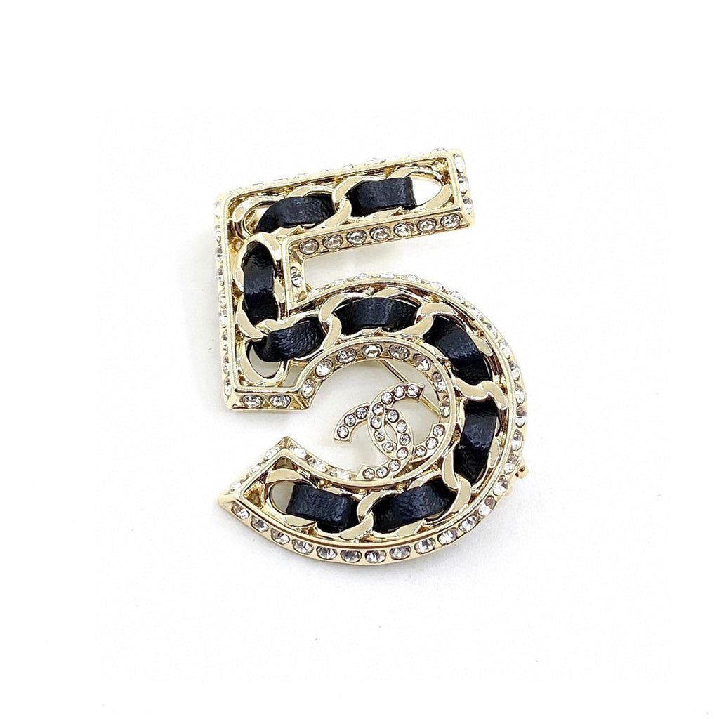 Chanel No.5 Strass 18K Gold Brooch product image 1, provided for visual reference and product detail review