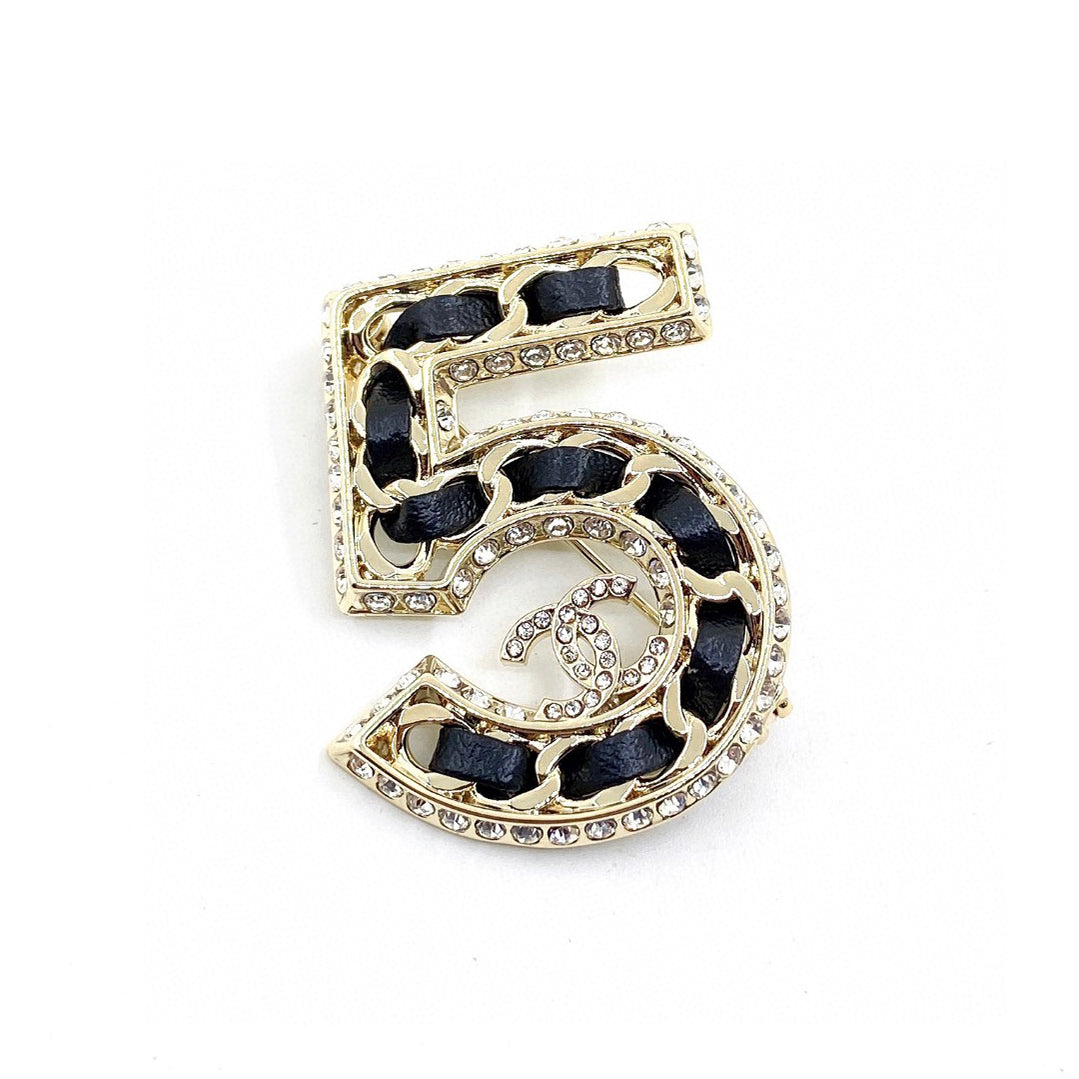 Chanel No.5 Strass 18K Gold Brooch product image 1, provided for visual reference and product detail review
