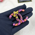 Chanel Pink Resin 18K Gold Brooch product image 1, provided for visual reference and product detail review