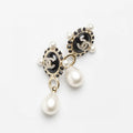 Chanel Pearl Pendant 18K Gold Earrings product image 1, provided for visual reference and product detail review