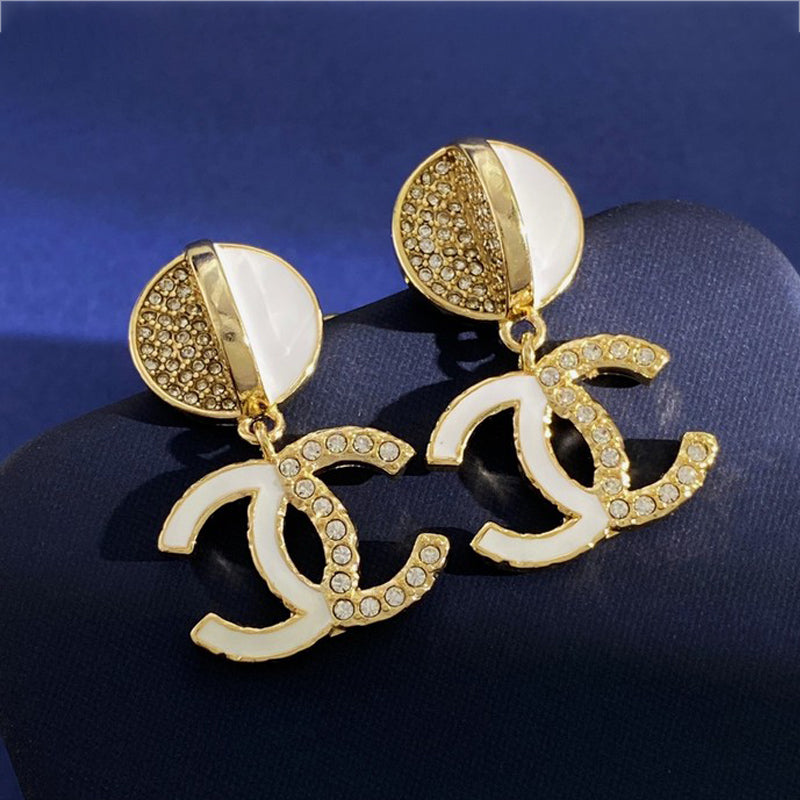 Chanel Half Diamond 18K Gold Earrings product image 1, provided for visual reference and product detail review