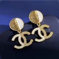 Chanel Half Diamond 18K Gold Earrings product image 1, provided for visual reference and product detail review