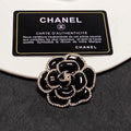Chanel Black Flower 18K Gold Brooch product image 1, provided for visual reference and product detail review