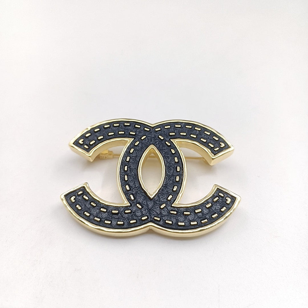 Chanel Black 18K Gold Brooch product image 1, provided for visual reference and product detail review