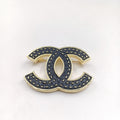 Chanel Black 18K Gold Brooch product image 1, provided for visual reference and product detail review