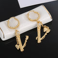 Heart Long 18K Gold Earrings product image 1, provided for visual reference and product detail review