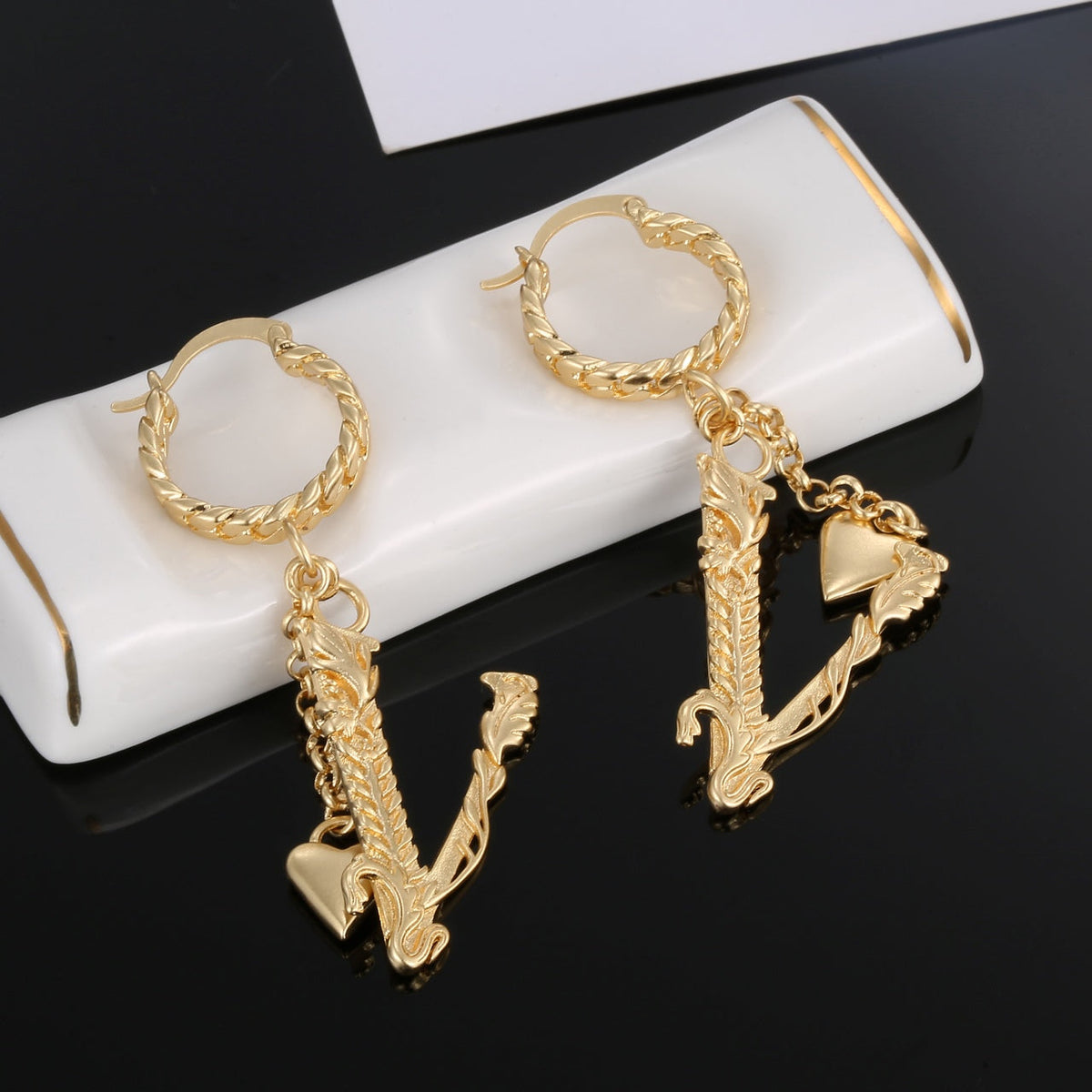 Heart Long 18K Gold Earrings product image 1, provided for visual reference and product detail review