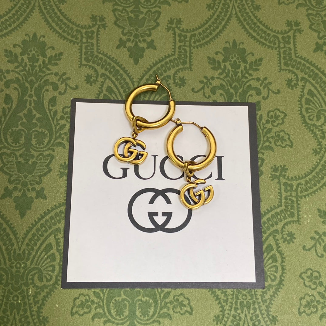 Gucci Double Hollow 18K Gold Earrings product image 3, provided for visual reference and product detail review