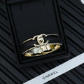 Chanel Black Leather Cuff 18K Gold Bracelet product image 1, provided for visual reference and product detail review