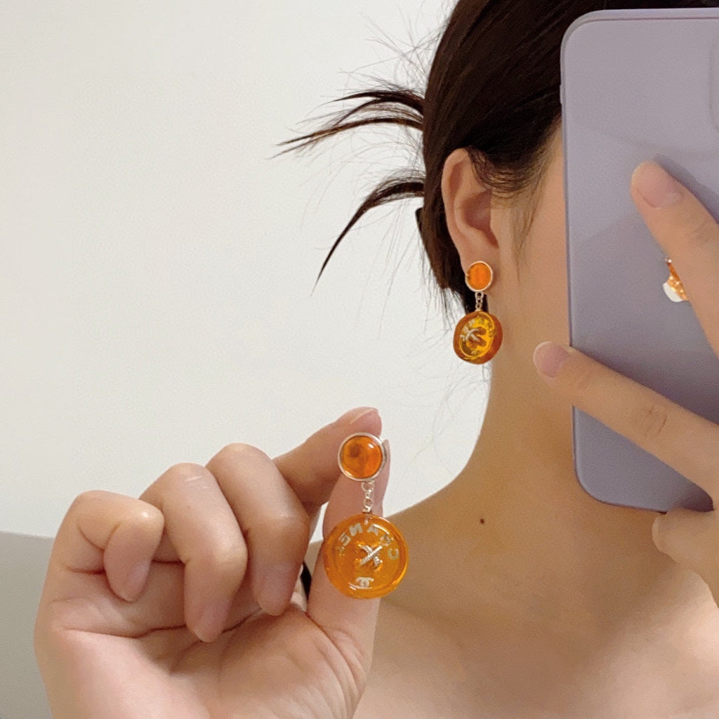 Chanel Orange Pendant 18K Gold Earrings product image 3, provided for visual reference and product detail review