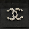 Chanel Black & Diamond 18K White Gold Brooch product image 1, provided for visual reference and product detail review