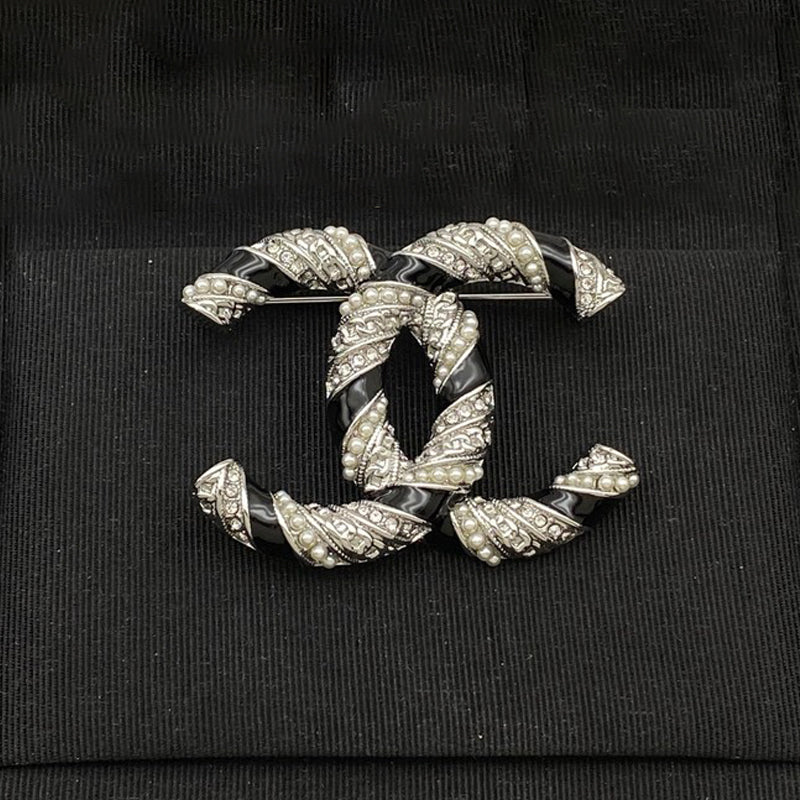 Chanel Black & Diamond 18K White Gold Brooch product image 1, provided for visual reference and product detail review