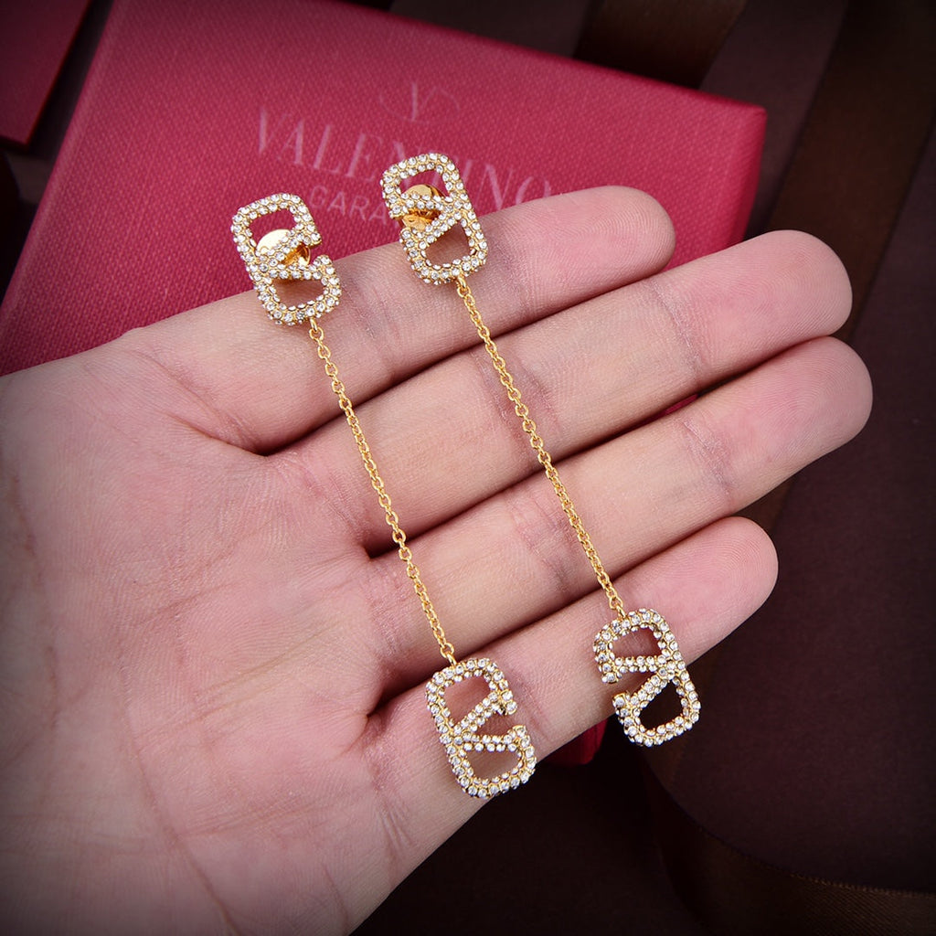 Valentino Crystal Valentino Signature 18K Gold Earrings product image 3, provided for visual reference and product detail