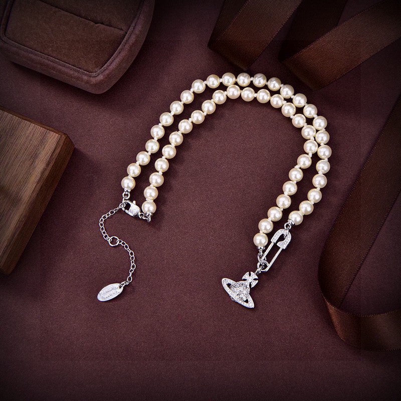 Vivienne West Mini Bas Relief Pearls 18K Gold Necklace product image 2, provided for visual reference and product detail