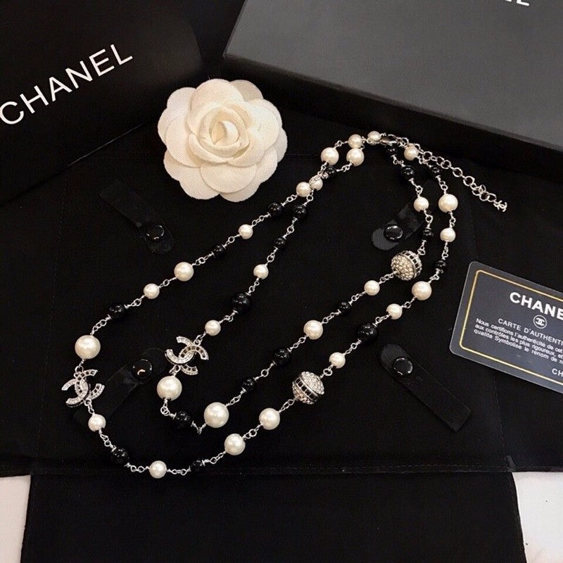 Chanel Long Black Pearl 18K Gold Necklace product image 1, provided for visual reference and product detail review
