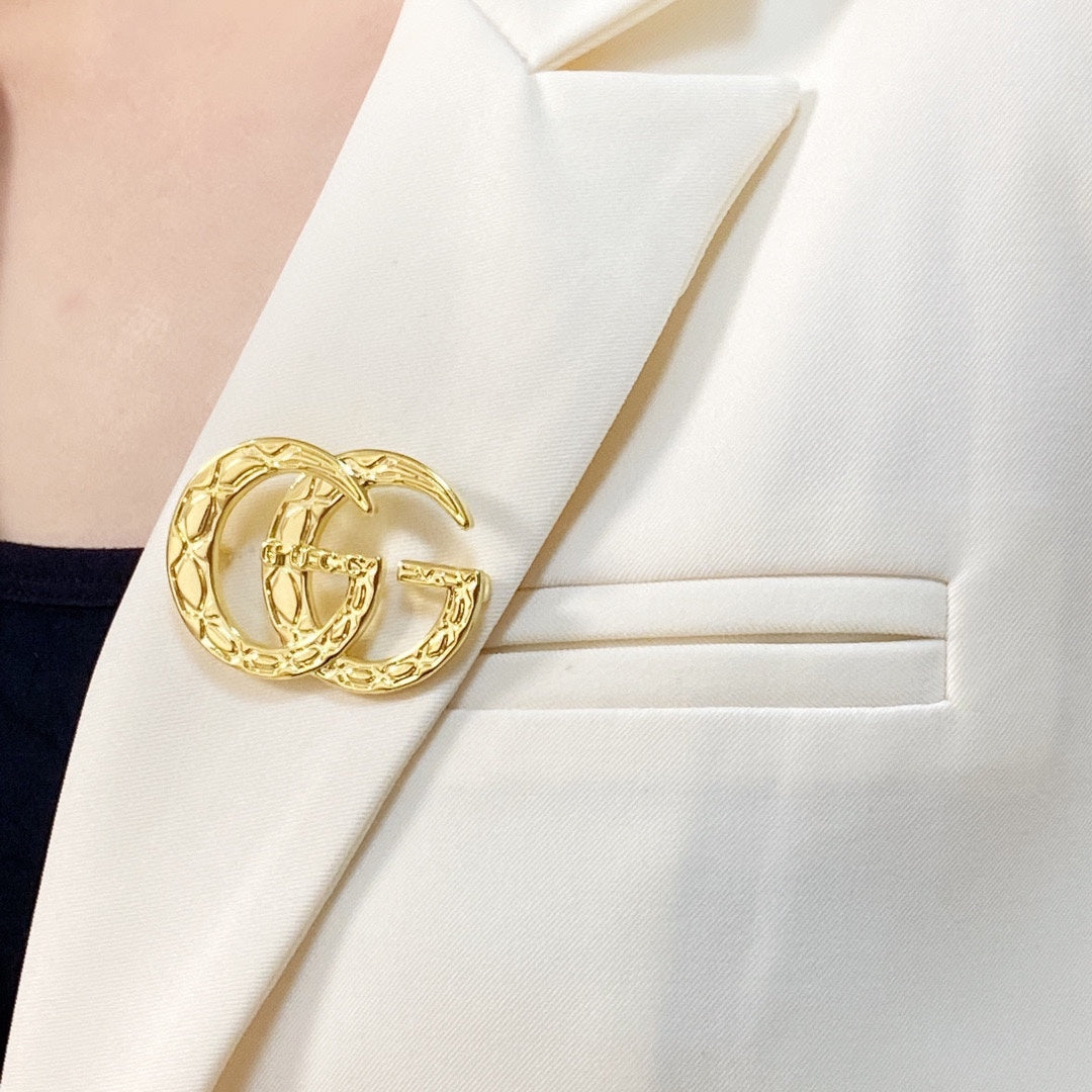 Gucci Double 18K Gold Brooch product image 2, provided for visual reference and product detail review
