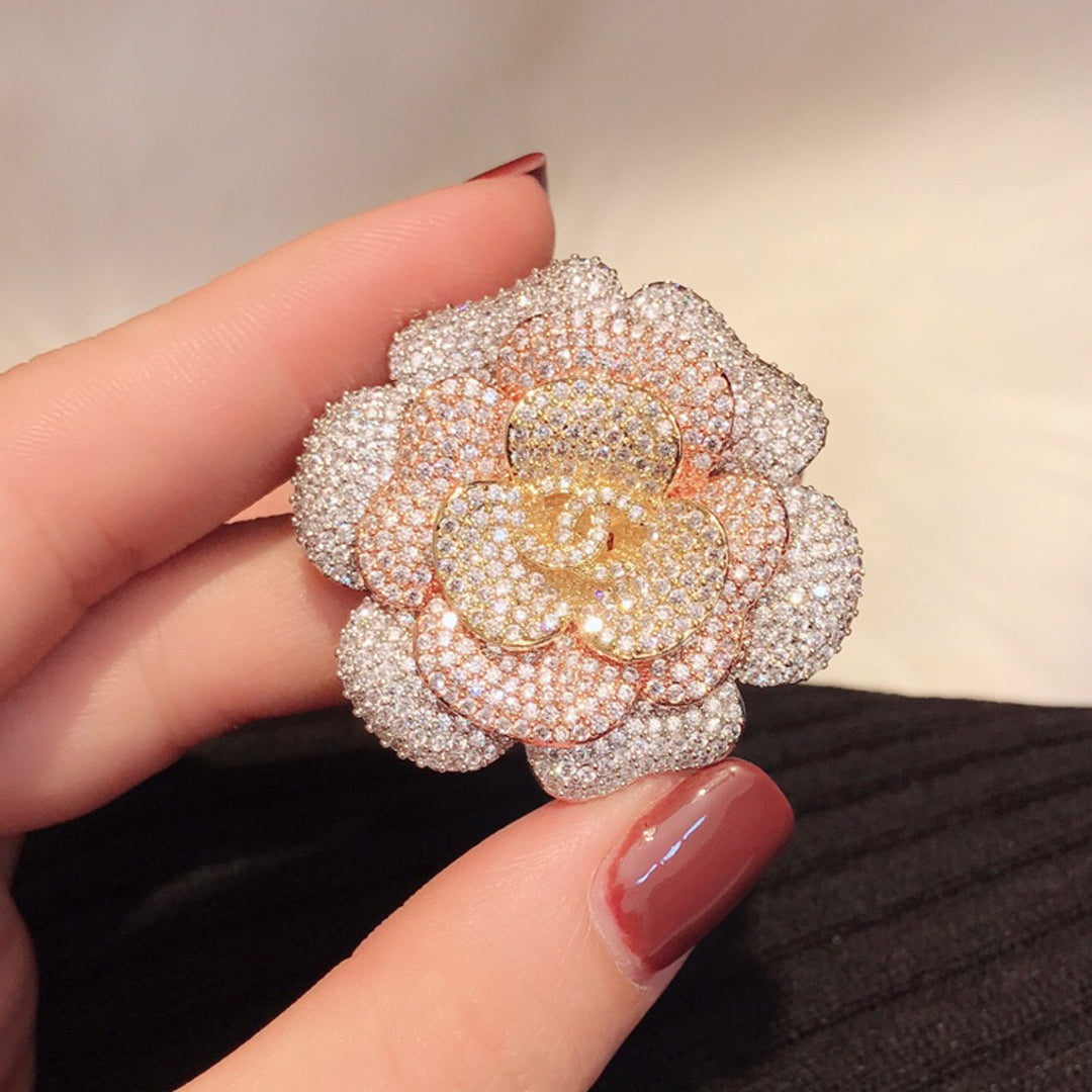 Chanel Pink Flower Diamond 18K Gold Brooch product image 1, provided for visual reference and product detail review