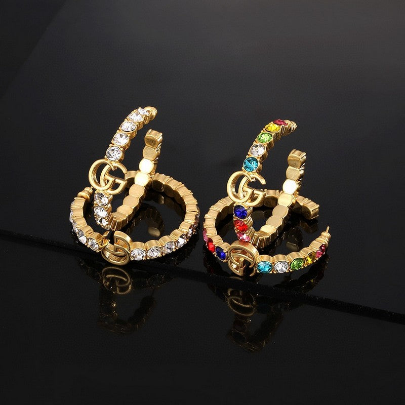 Gucci Double Color Crystal 18K Gold Earrings product image 1, provided for visual reference and product detail review