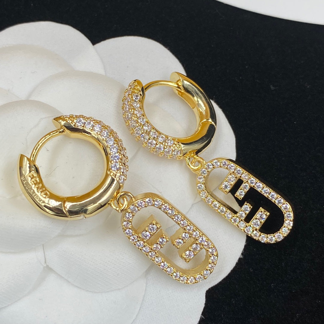 Fendi OLock Diamonds 18K Gold Earrings product image 1, provided for visual reference and product detail review