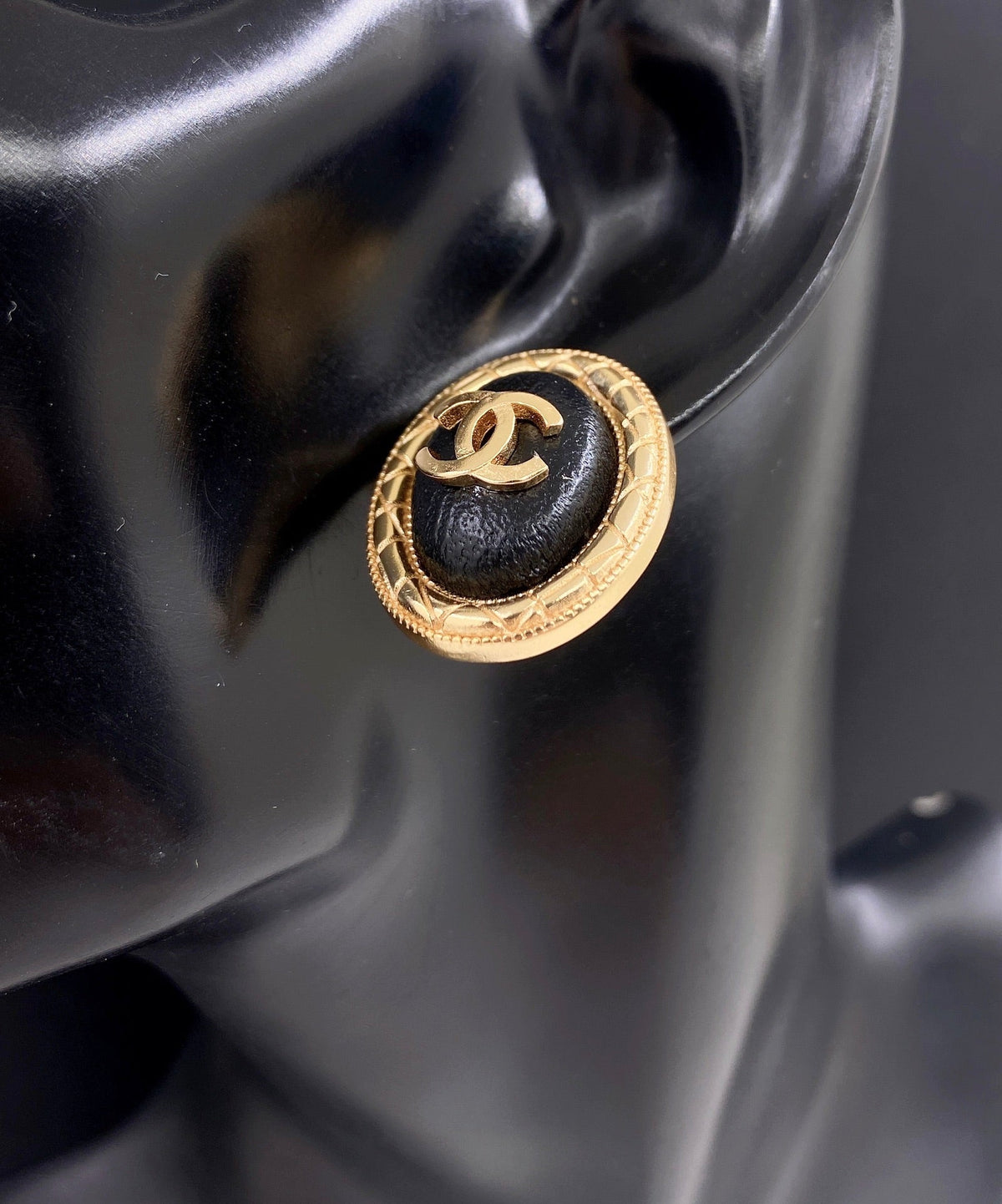 Chanel Oval Leather 18K Gold Earrings product image 2, provided for visual reference and product detail review