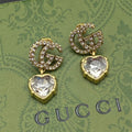 Gucci Double Crystal Pendant 18K Gold Earrings product image 1, provided for visual reference and product detail review