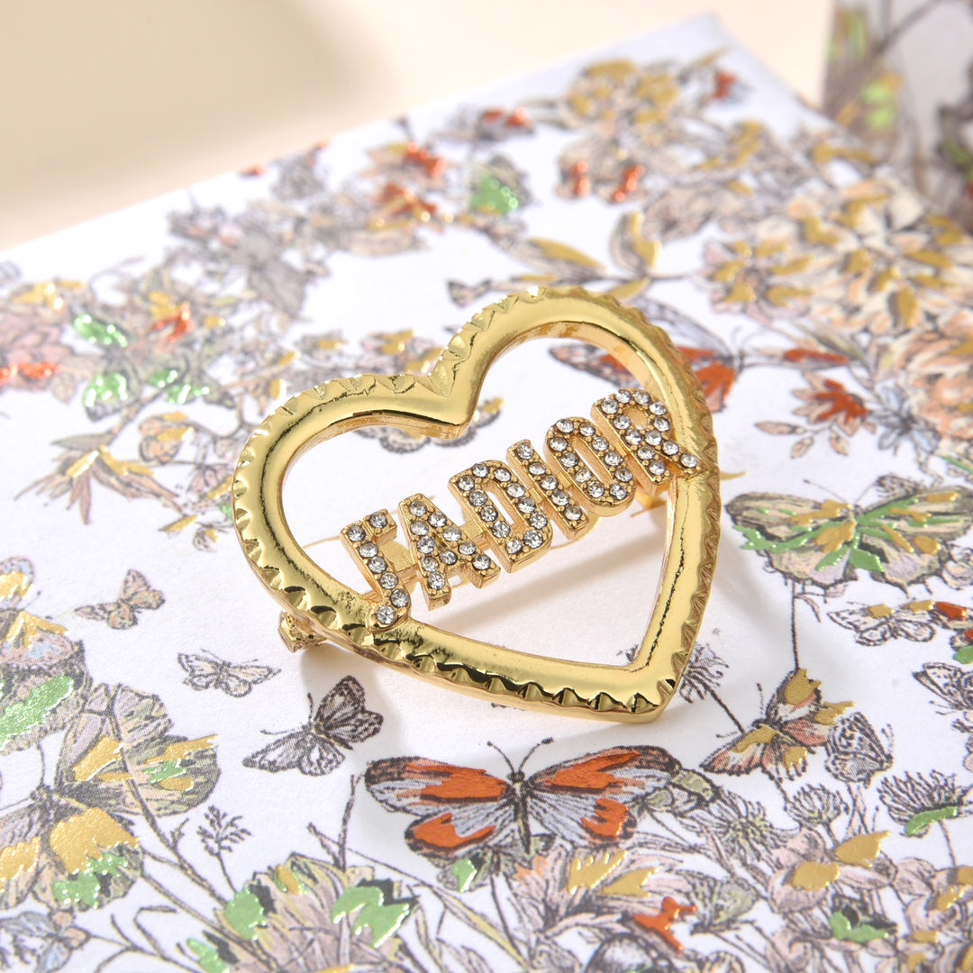 Dior J'adore Crystals 18K Gold Brooch product image 1, provided for visual reference and product detail review