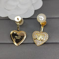 Celine Diamond Heart 18K Gold Earrings product image 1, provided for visual reference and product detail review