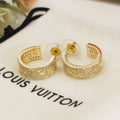 Louis Vuitton Circle 18K Gold Earrings product image 1, provided for visual reference and product detail review