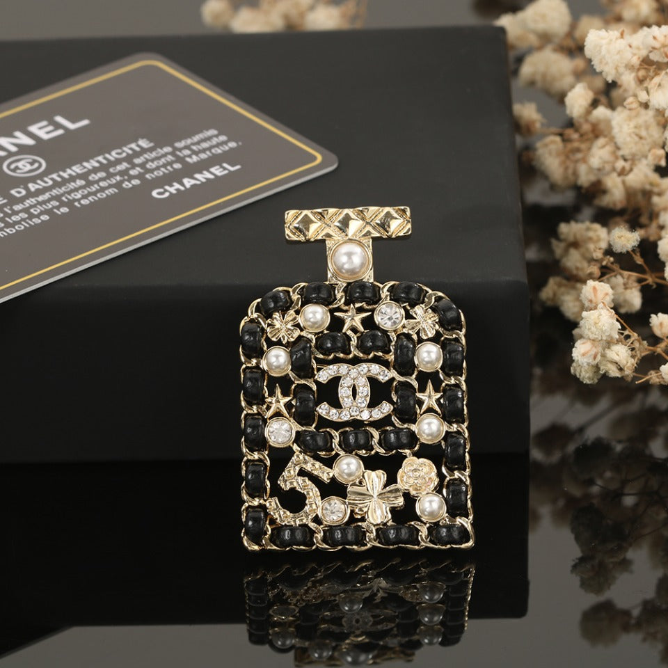 Chanel Bottle Strass 18K Gold Brooch product image 2, provided for visual reference and product detail review