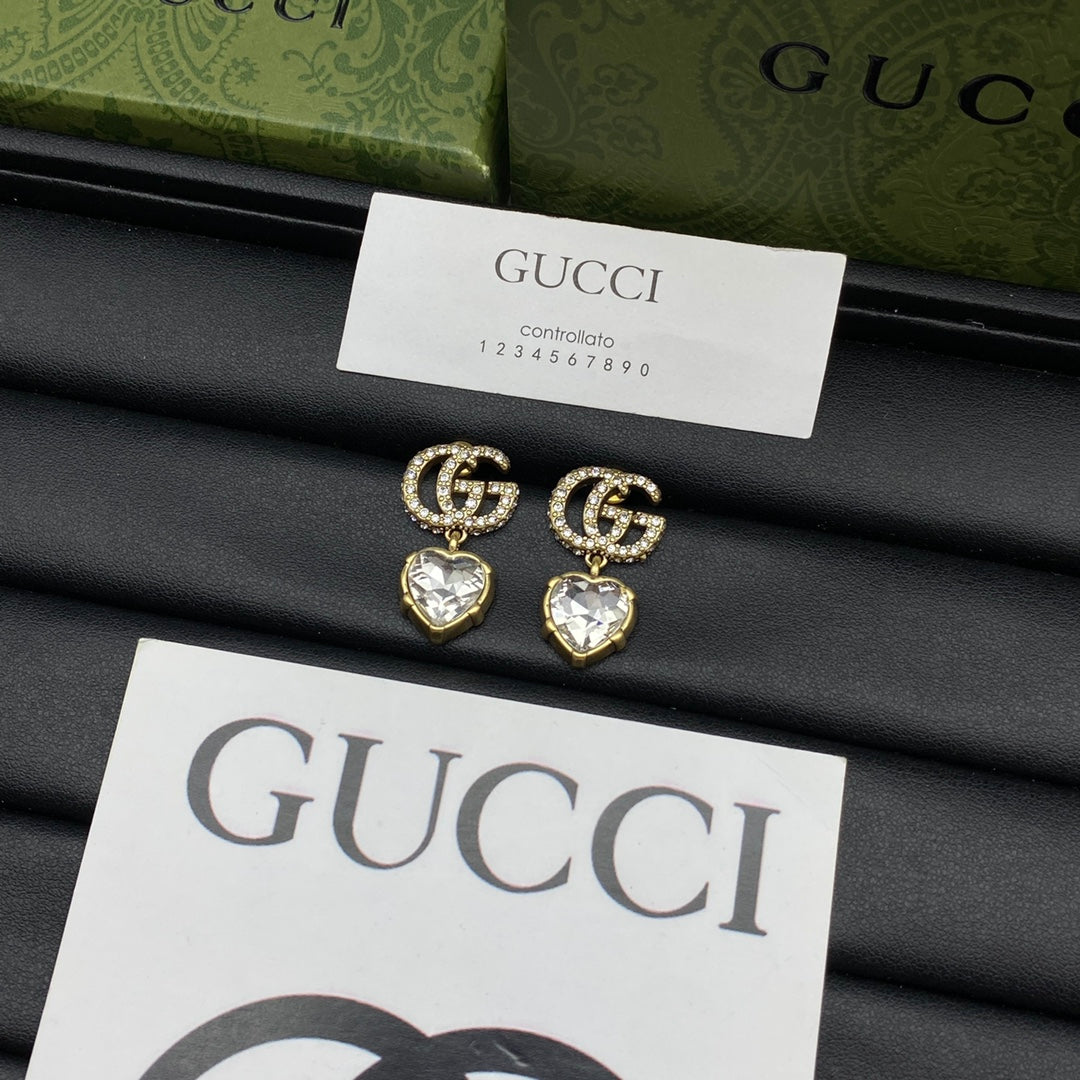 Gucci Double Crystal Pendant 18K Gold Earrings product image 4, provided for visual reference and product detail review