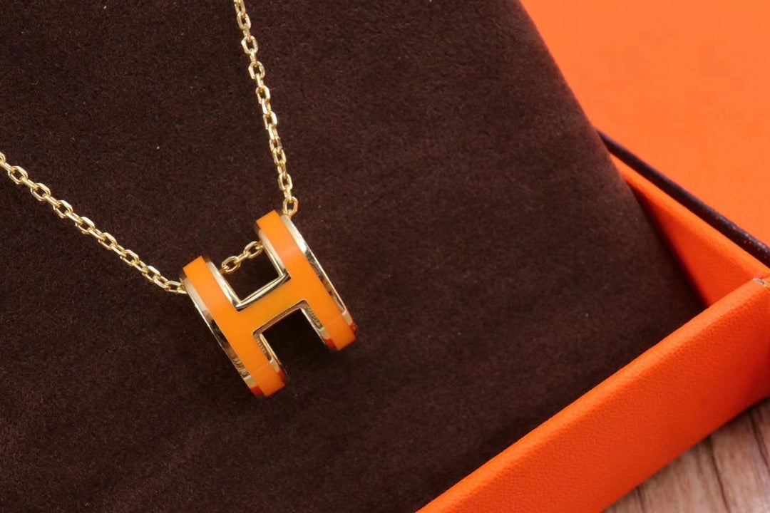 Hermes Mini Pop Orange 18K Gold Necklace product image 5, provided for visual reference and product detail review