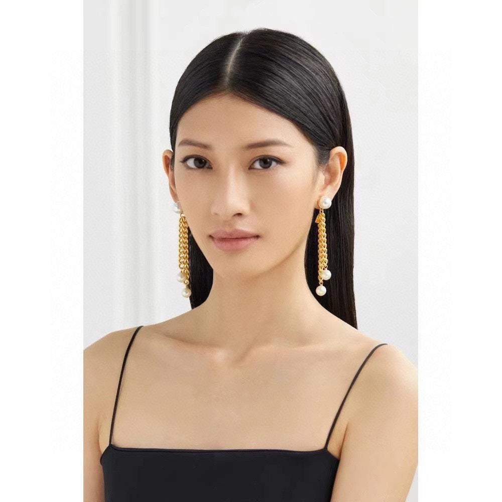 Celine Pearls Long 18K Gold Earrings product image 3, provided for visual reference and product detail review
