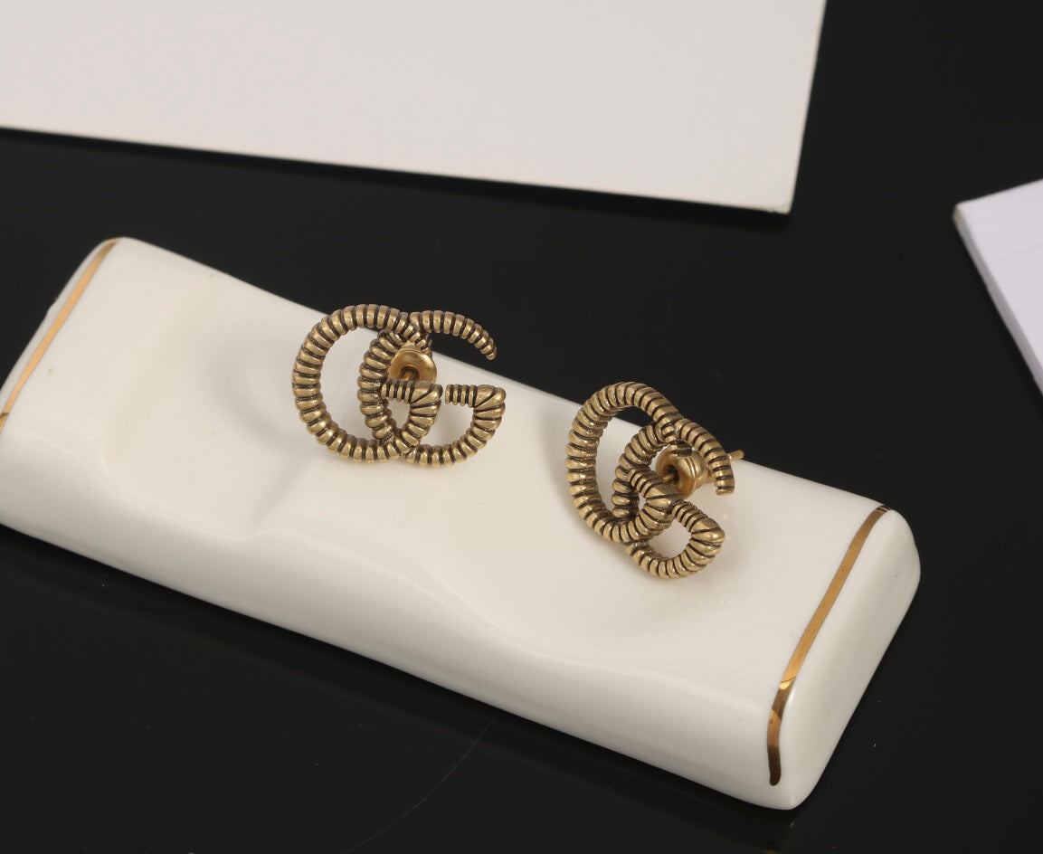 Gucci Double 18K Gold Earrings product image 7, provided for visual reference and product detail review